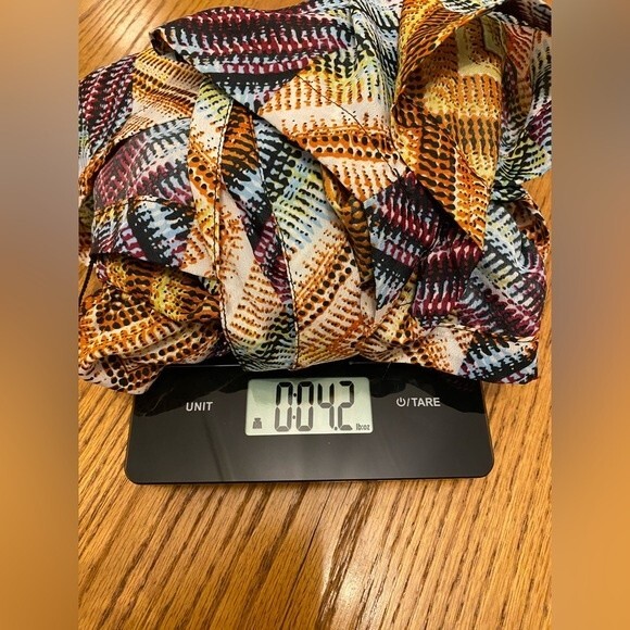 I.Q. Authentic Brand Colorful Diamond Textured Tie Neck Beaded Ring Romper - Picture 16 of 16